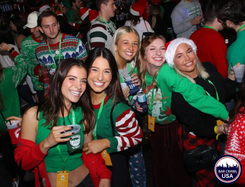 Ugly Sweater Crawl participants partying with Bar Crawl USA. The Best Cleveland Bar Crawls