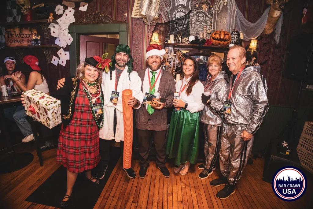 Group of costumed partygoers at the Boos and Booze Halloween Bar Crawl by Bar Crawl USA